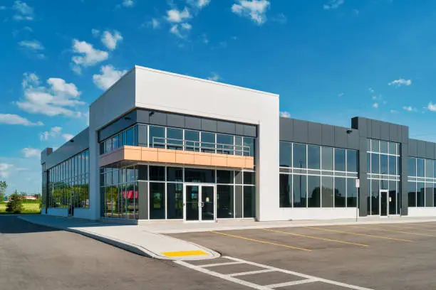 Office building with smooth gray and white exterior finishes by an exterior painter in Sebastian, FL