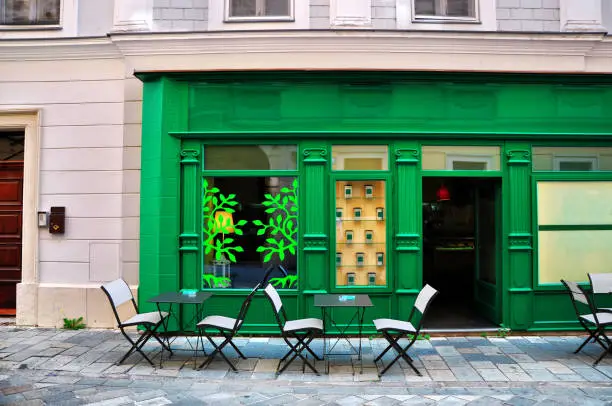Retail storefront with vibrant green exterior paint and smooth finishes by an exterior painter in Fellsmere, FL.
